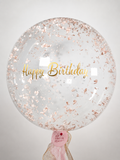 Luxury 24-inch personalized bubble balloon with real dried hydrangea flowers and custom gold lettering by Air Moon NYC